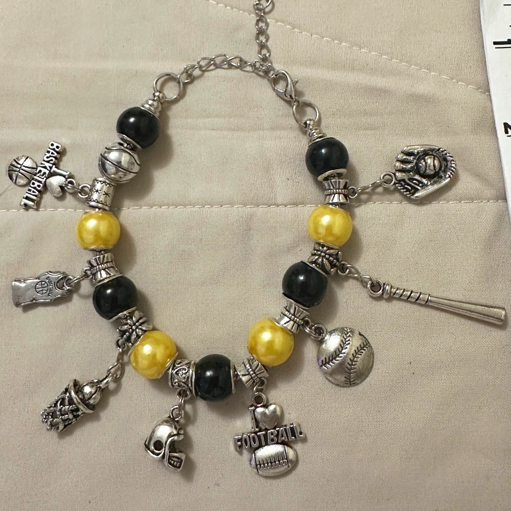 Handmade-NWOT- 925 SS plated charm bracelet. Sports charms. Yellow & black beads